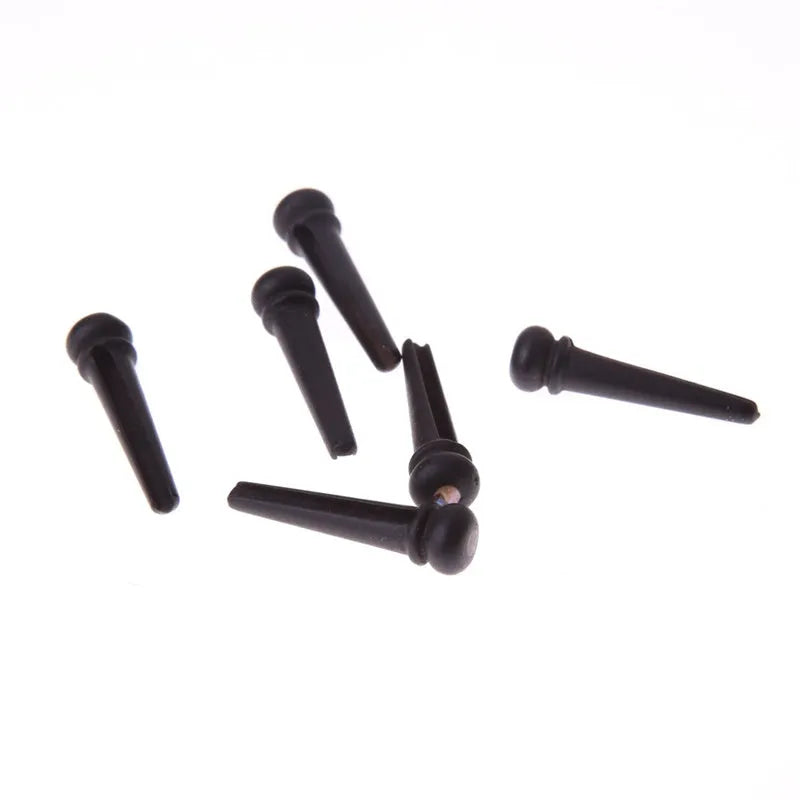 Six ebony folk guitar string nails with matt black finish for acoustic guitar repair