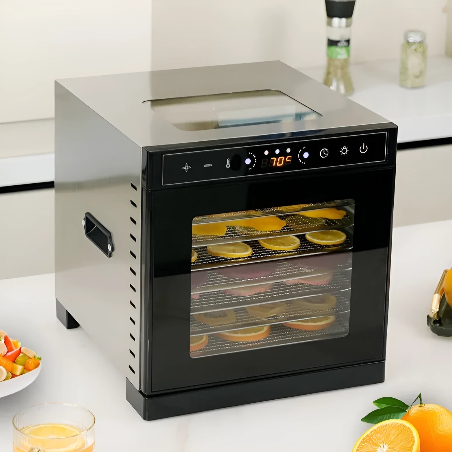 Stainless steel fruit dehydrator with transparent skylight lid showing six drying trays inside