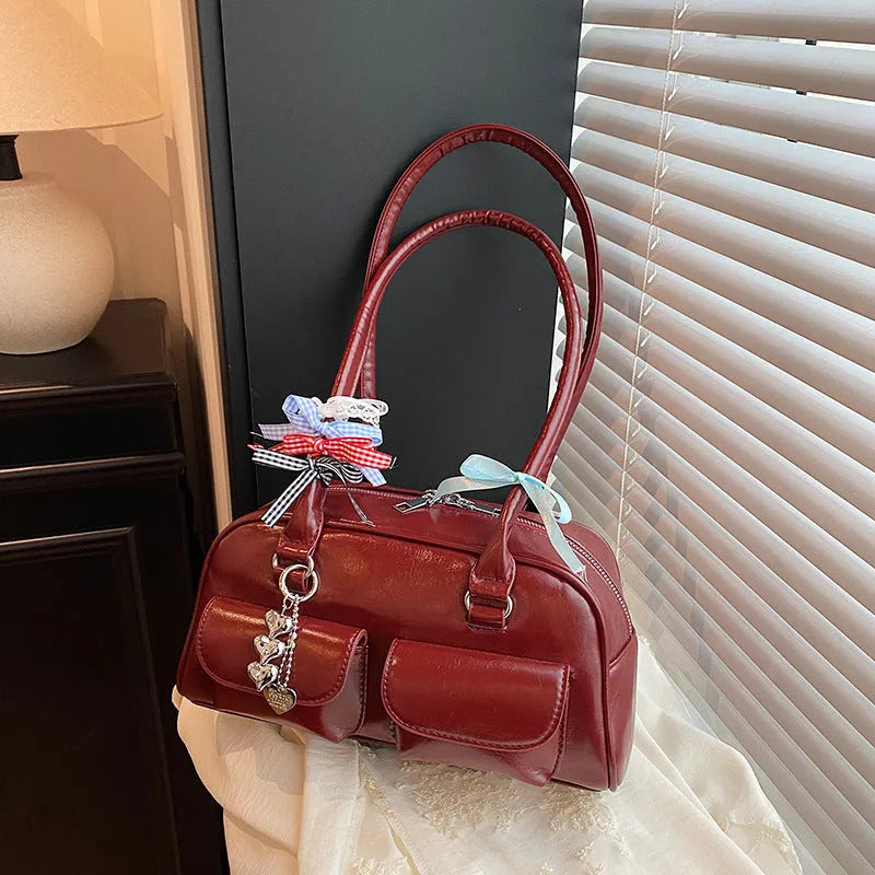 PU leather women's pillow handbag with flap closure and double shoulder straps in retro design