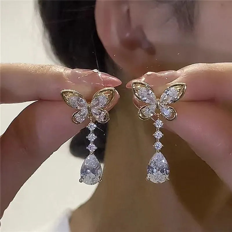 Platinum bow-shaped stud earrings with zinc alloy electroplated construction