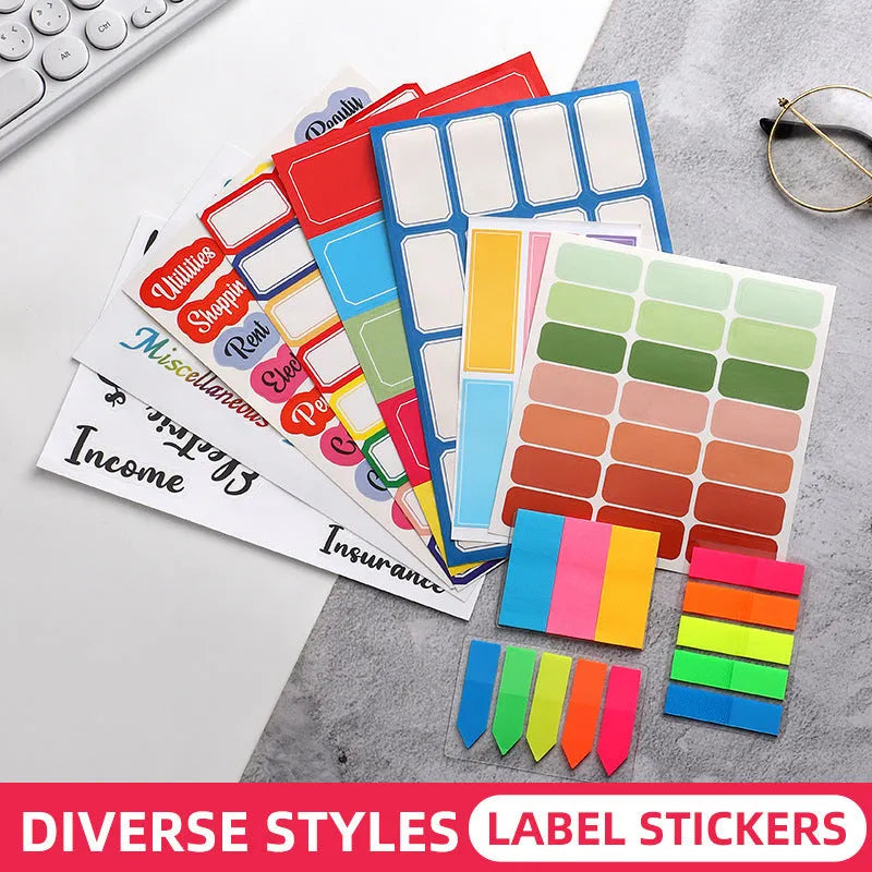 Assorted paper adhesive stickers including grid sheets, colourful sticky notes, and A6 ruler on a surface.