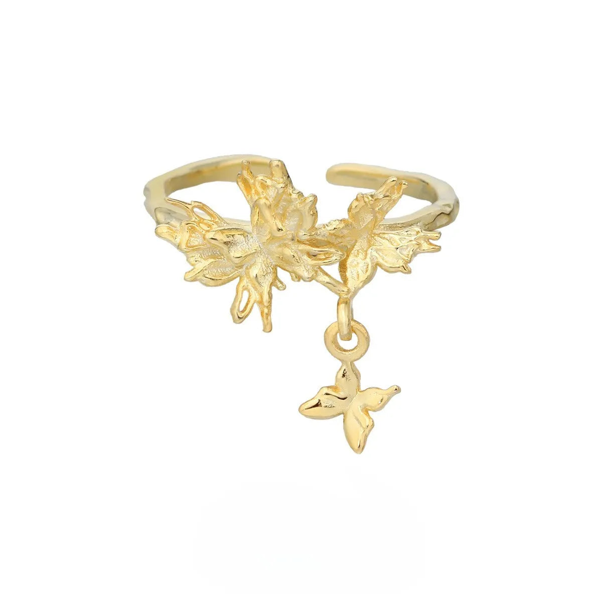 Adjustable silver butterfly ring with gold electroplating on model's finger