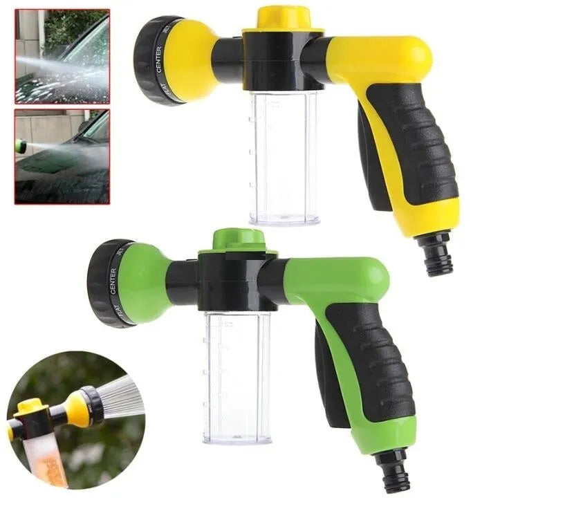 Green high-pressure foam spray gun with adjustable nozzle and attached water hose for car and garden cleaning.
