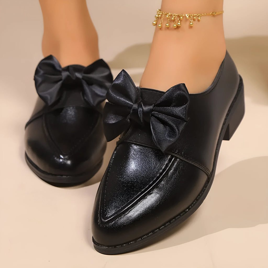 Women's British-style leather shoes with decorative bow detail and pointed toe in multiple colour options