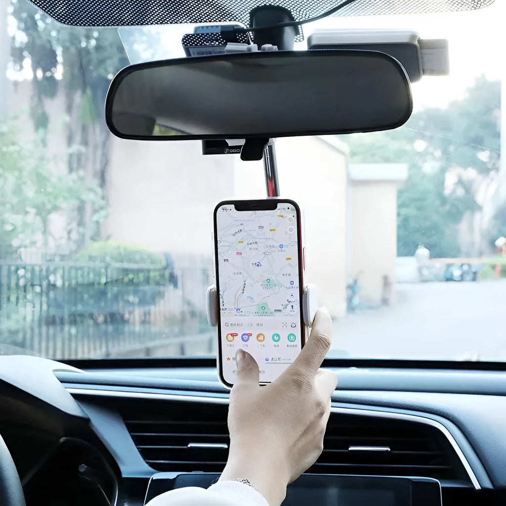 ABS plastic phone bracket mounted on vehicle rearview mirror holding smartphone