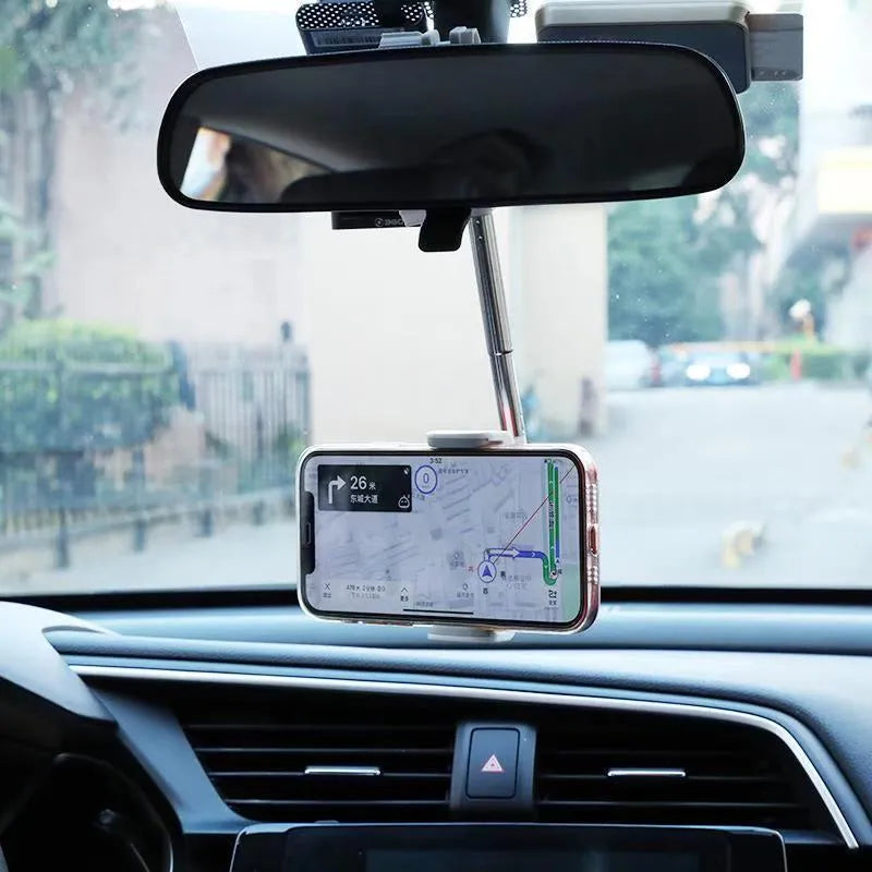 ABS plastic phone bracket mounted on vehicle rearview mirror holding smartphone