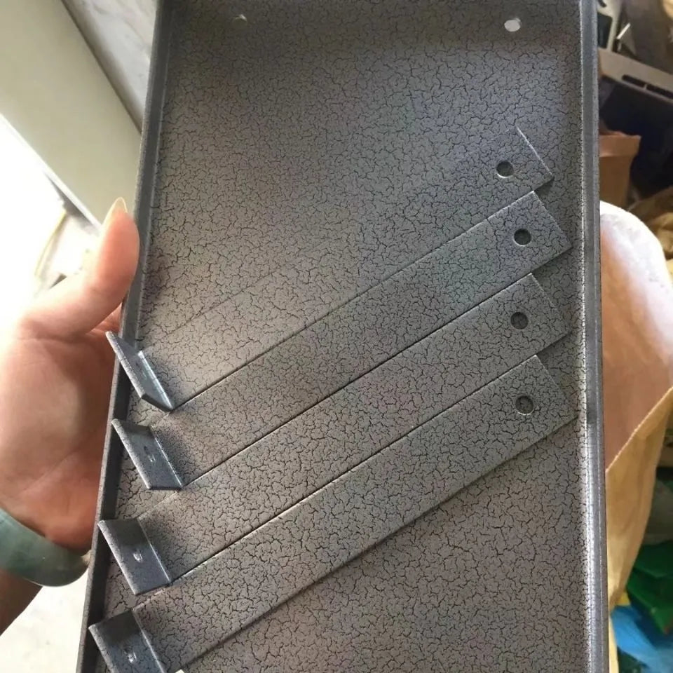 Black iron flip chip mounting bracket for a portable electric planer.