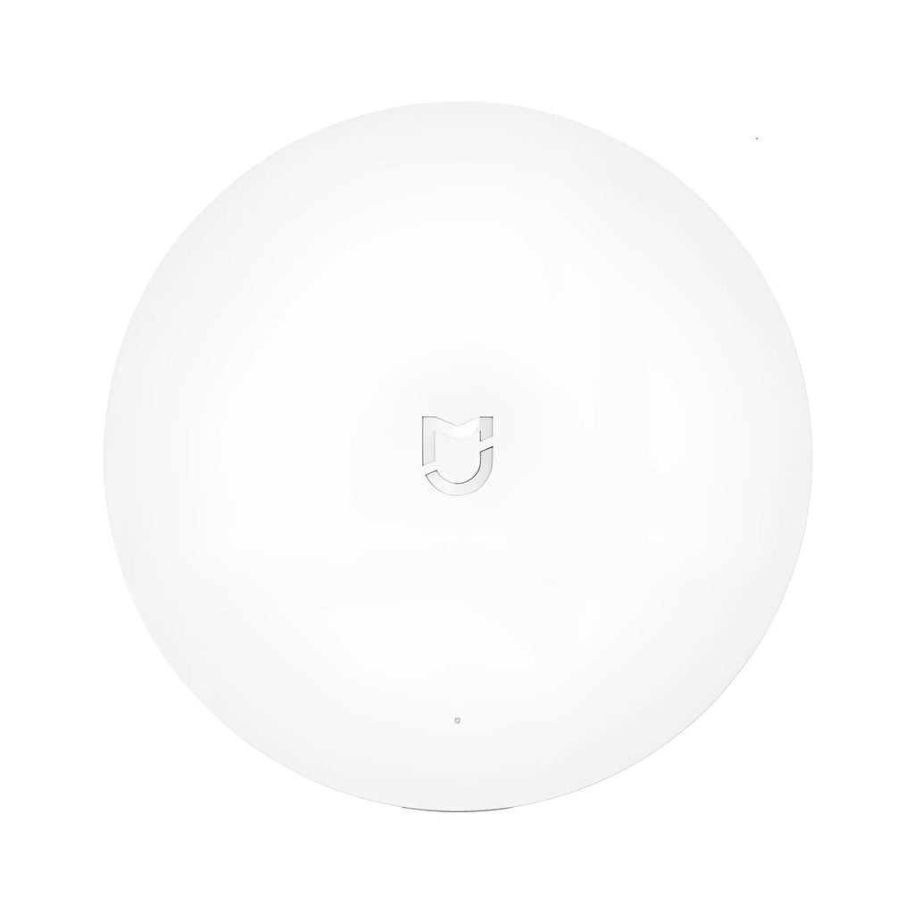 White circular Xiaomijia smart home gateway wall switch with UK plug for wireless device control