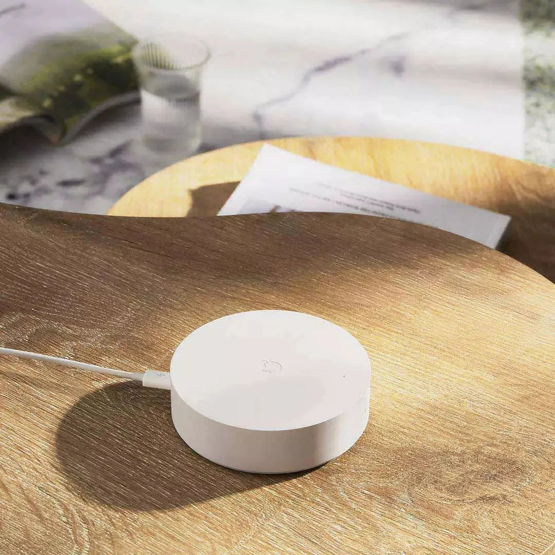 White circular Xiaomijia smart home gateway wall switch with UK plug for wireless device control