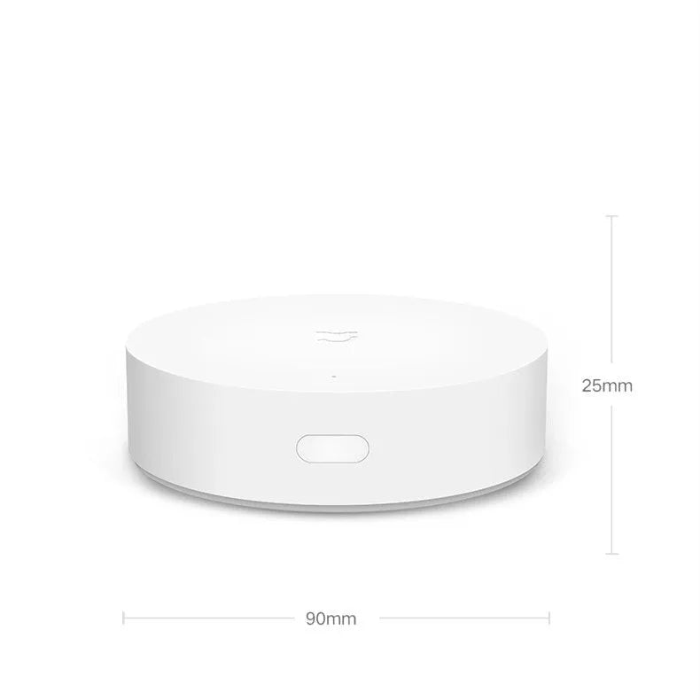 White circular Xiaomijia smart home gateway wall switch with UK plug for wireless device control