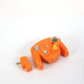 NGC wireless game handle controller in black for Wii and GameCube consoles showing ABS body and button layout