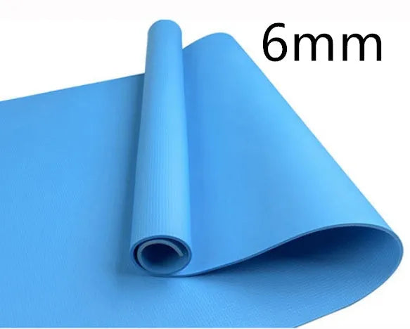 Red EVA fitness yoga mat with 6mm thickness on a wooden floor.