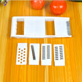 White 5-piece multifunctional kitchen grater and slicer set in stainless steel and ABS with hand guard, 28.3 x 13.2 cm