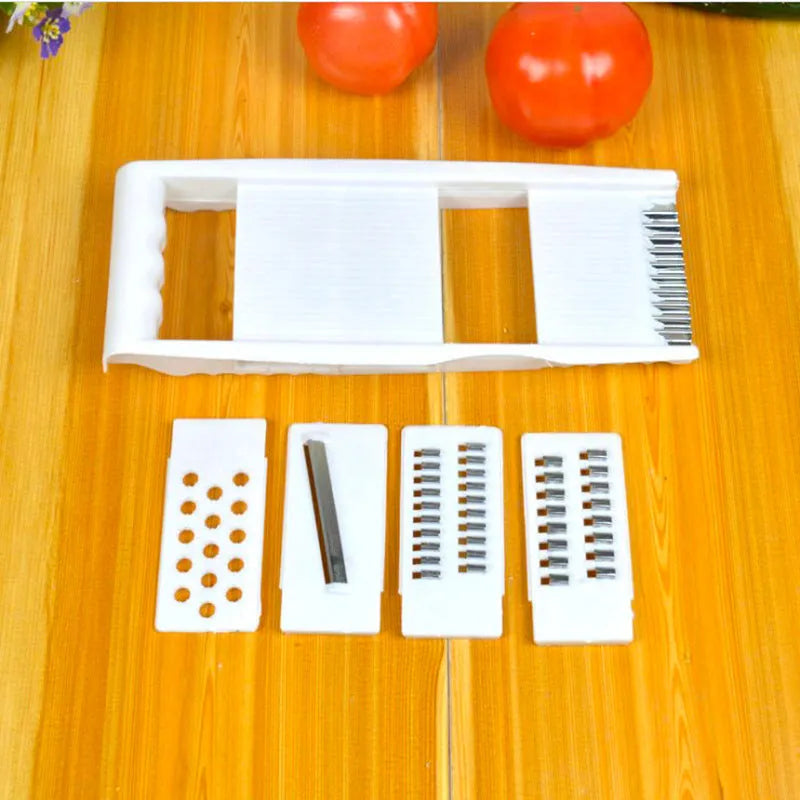 White 5-piece multifunctional kitchen grater and slicer set in stainless steel and ABS with hand guard, 28.3 x 13.2 cm