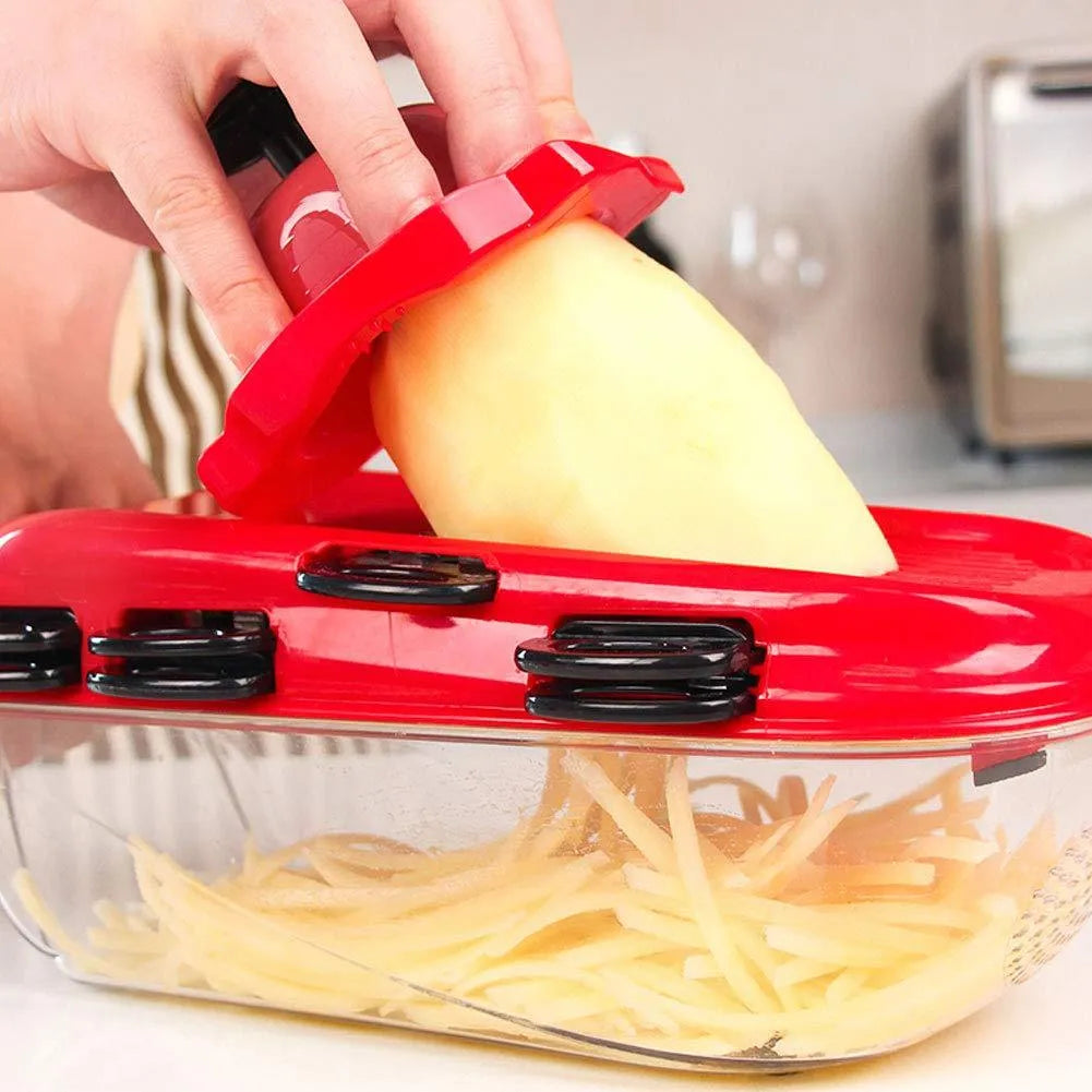 Red multi-function vegetable cutter set with seven stainless steel blades and a hand guard.