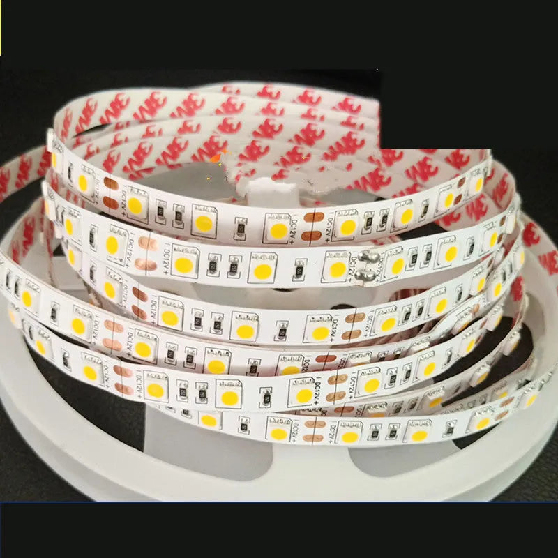 A flexible white LED light strip, 12V, for mounting on retail shelves or counters.