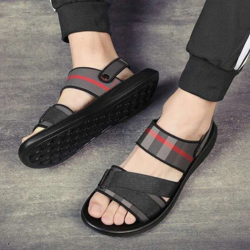 A pair of youth leisure sandals with a blue Lycra upper and a light polyurethane sole