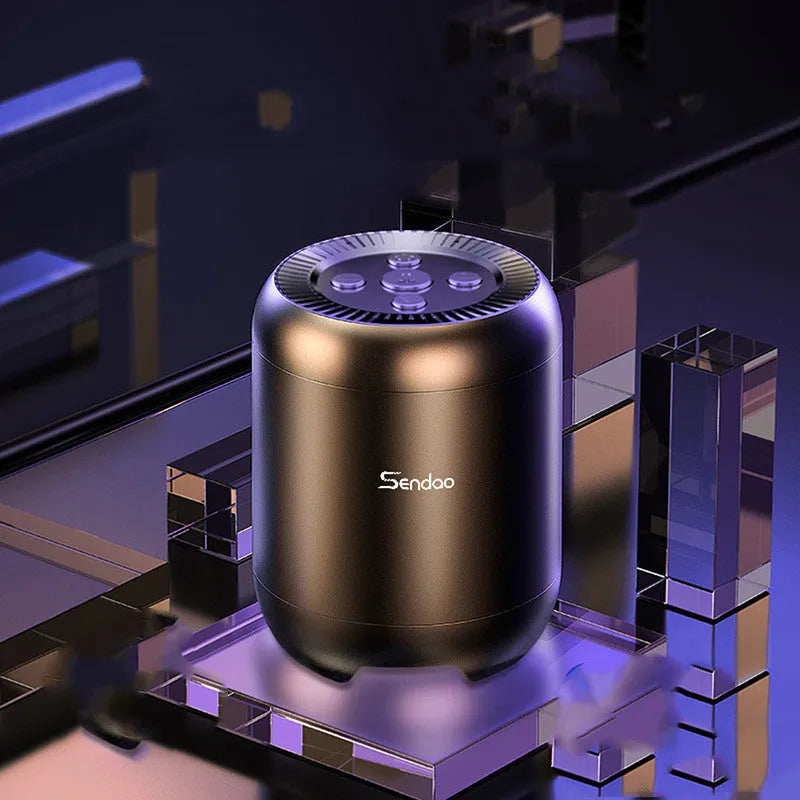 Compact black or white wireless Bluetooth speaker with card reader slot and USB port