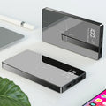 20000mAh wireless power bank with digital display, mirror finish, two USB ports, black or white, 73mm x 153mm x 22mm