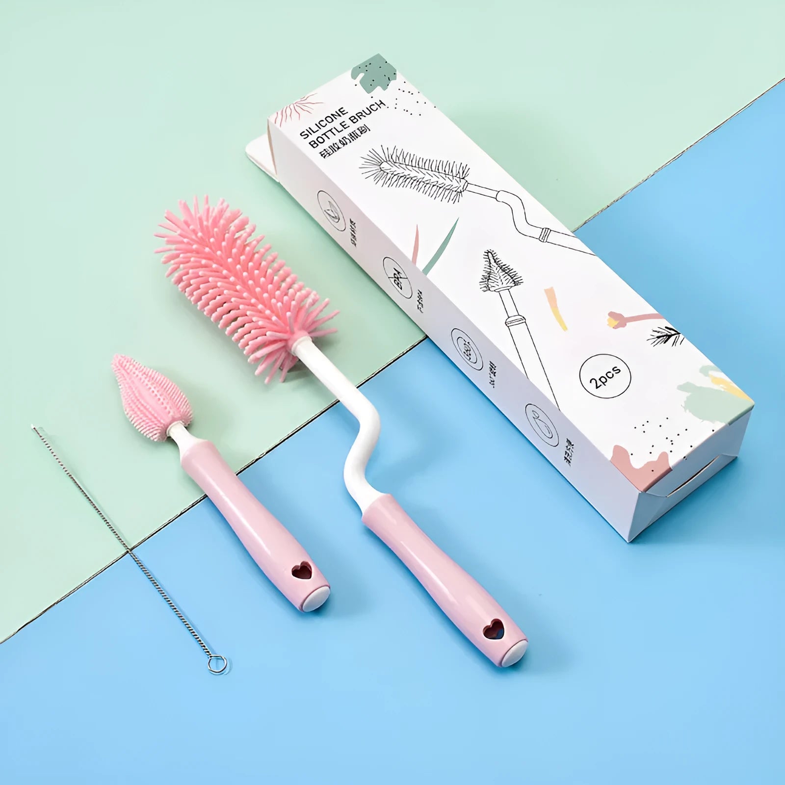 Silicone baby bottle brush set with straw cleaning attachment in pink, blue, and yellow colour options