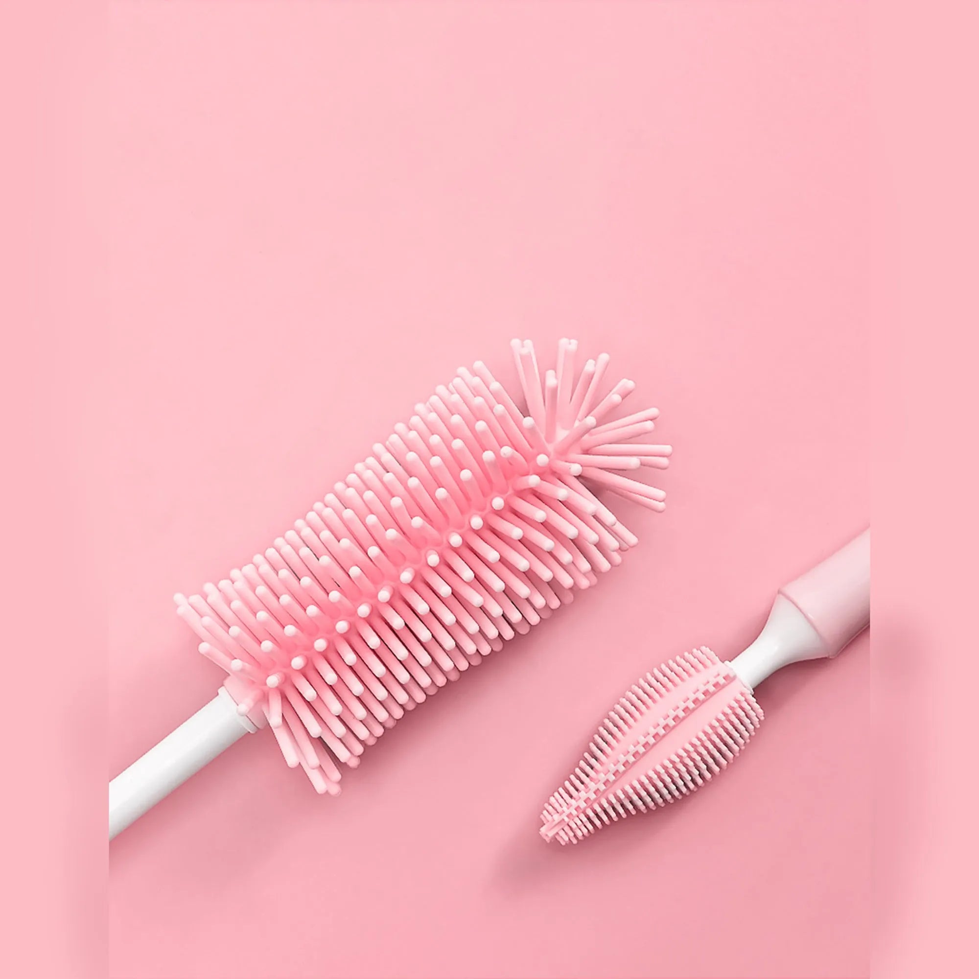 Silicone baby bottle brush set with straw cleaning attachment in pink, blue, and yellow colour options