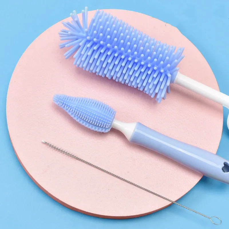 Silicone baby bottle brush set with straw cleaning attachment in pink, blue, and yellow colour options