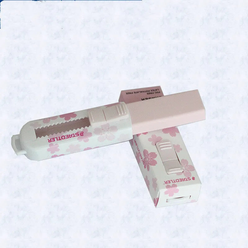 Pink square push-pull rubber eraser with replaceable core, shown with dimensions.