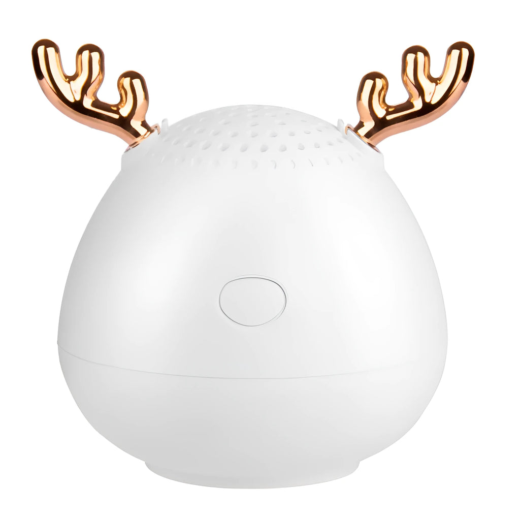 Compact portable Bluetooth speaker in white, pink, or green with USB charging cable