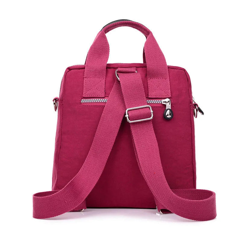 Ladies waterproof nylon cross-body shoulder bag, 25cm high, 24cm long, 12cm thick, in dark blue, black and beige.