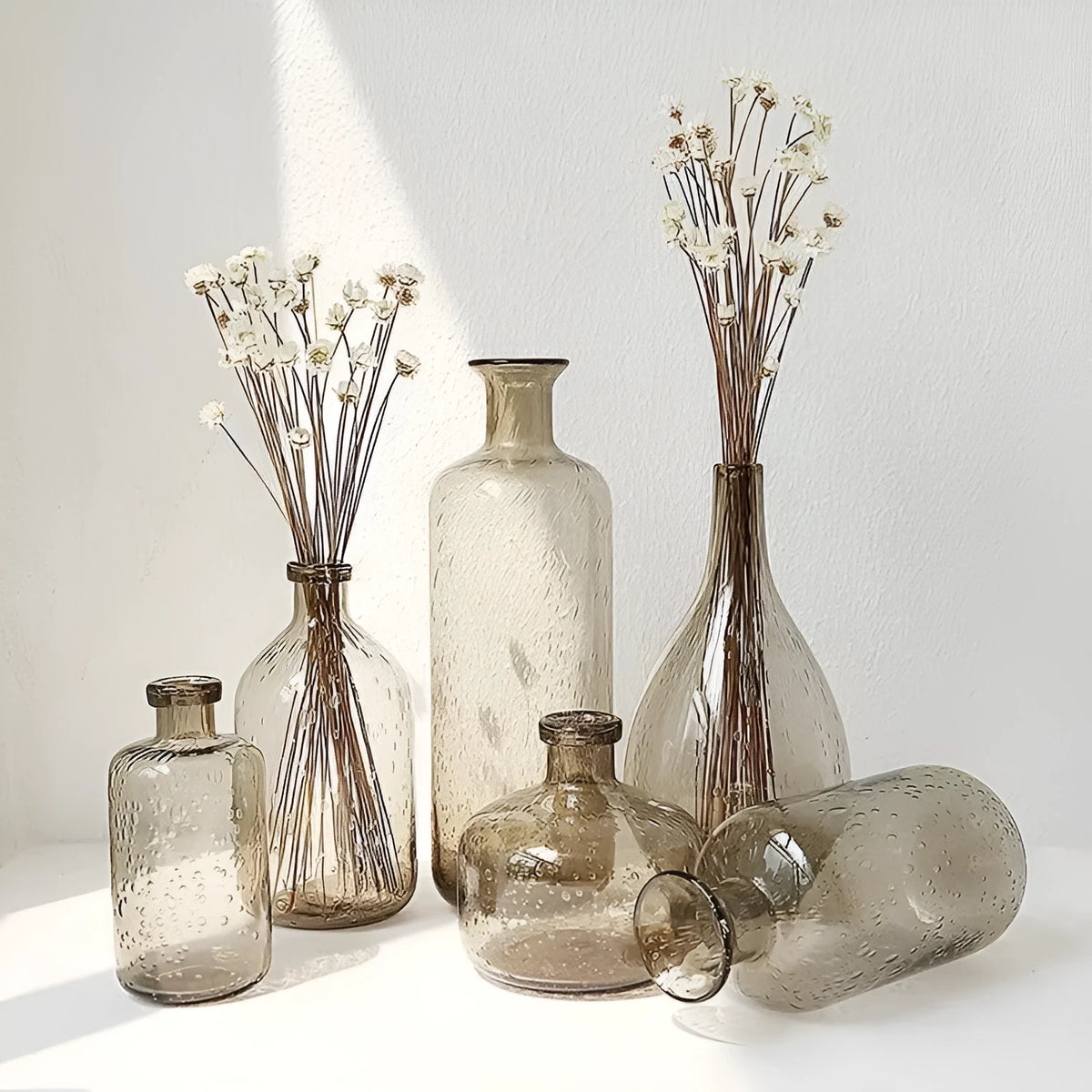Geometric bubble glass vase with stained glass construction and textured surface in grey colour