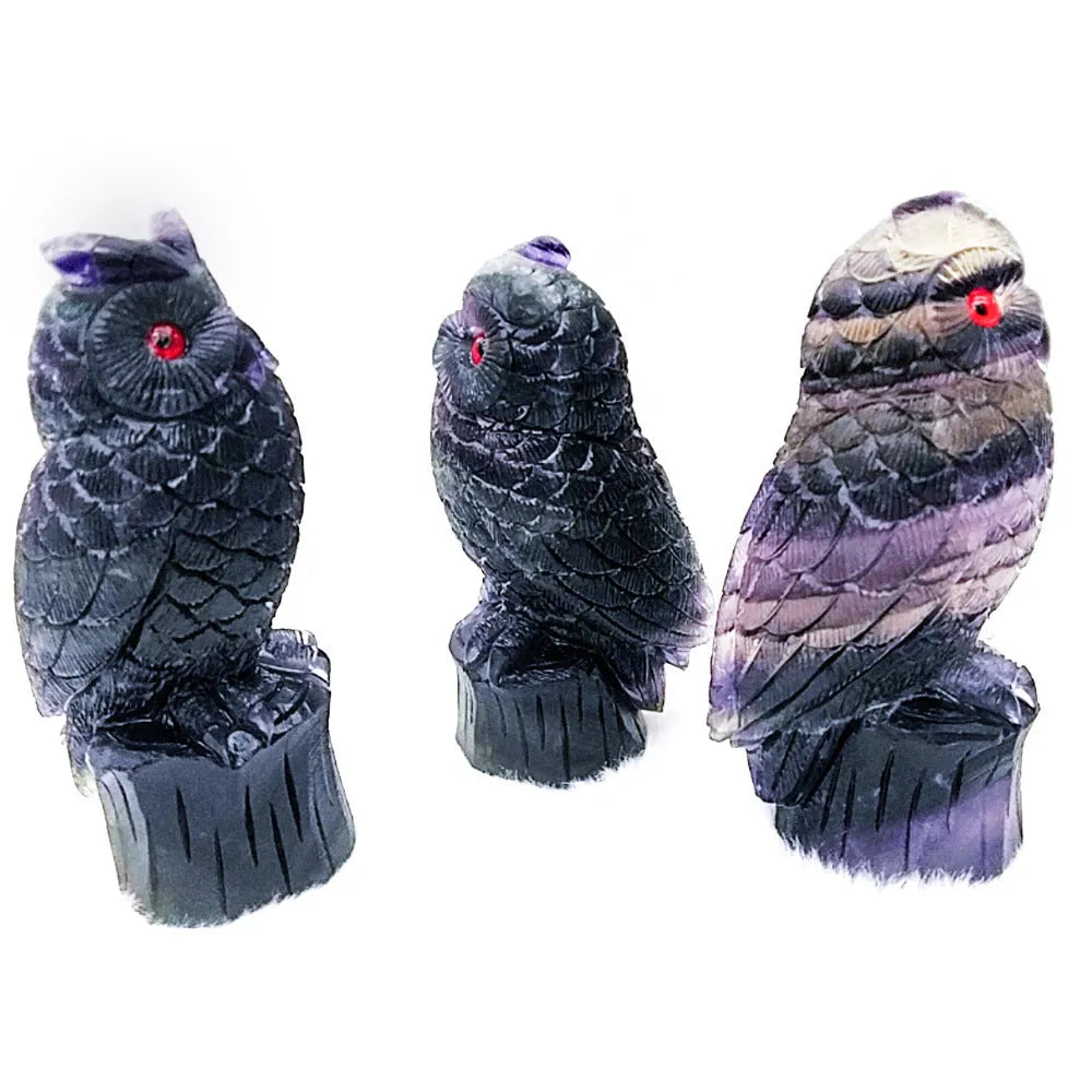 Purple fluorite hand carved owl ornament with natural stone texture and colour variations