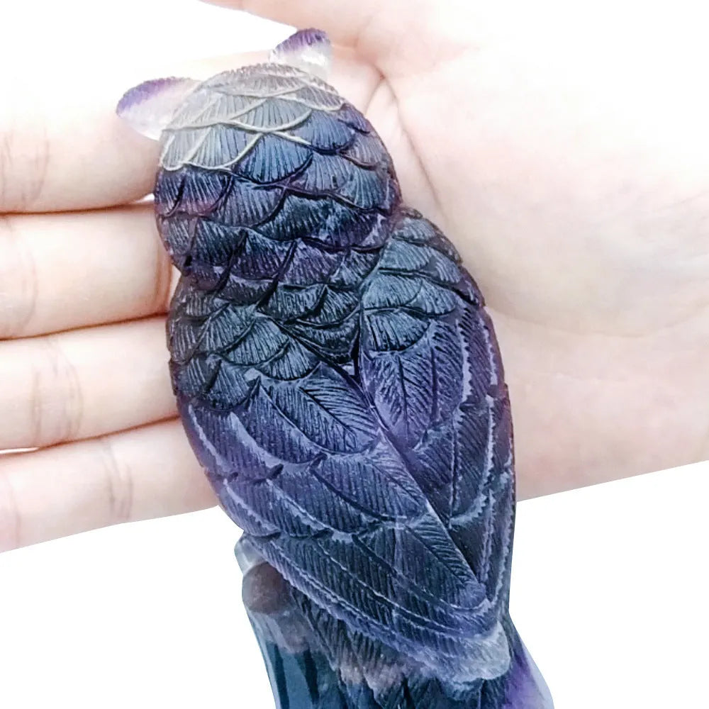 Purple fluorite hand carved owl ornament with natural stone texture and colour variations
