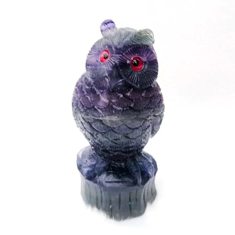 Purple fluorite hand carved owl ornament with natural stone texture and colour variations