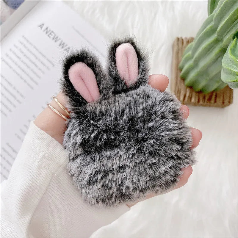 Pink plush silicone AirPods cover with rabbit ears design