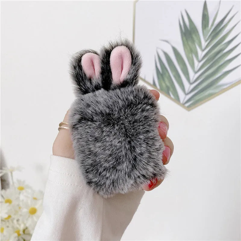 Pink plush silicone AirPods cover with rabbit ears design