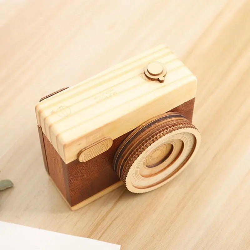Wooden rotating camera music box in pine wood with carton packaging