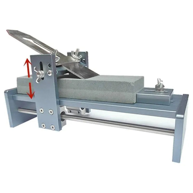 Aluminium fixed angle sharpening tool for woodworking chisels and planers on a workbench.