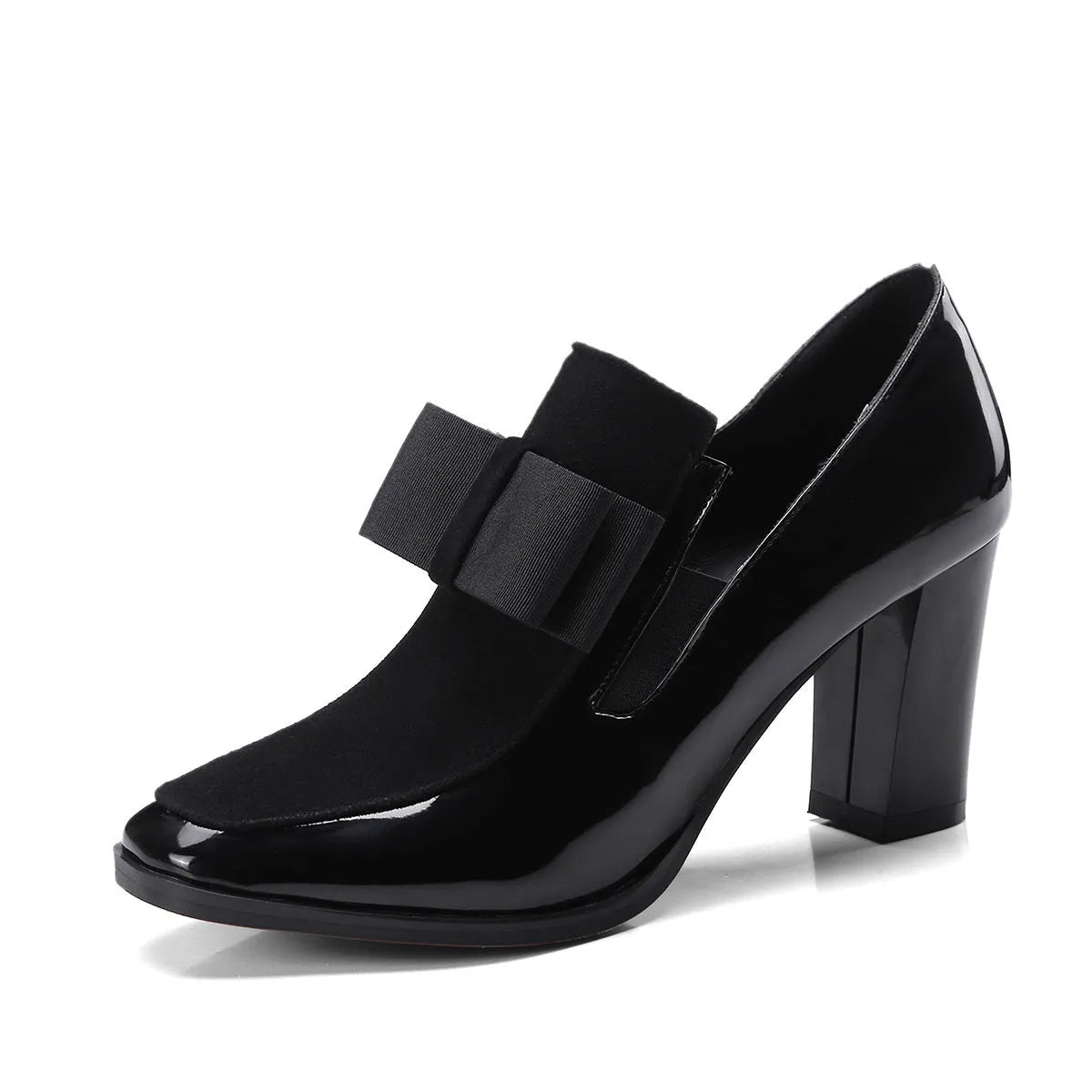 Large size black patent leather women's high heel shoe with a thick heel over 8cm.