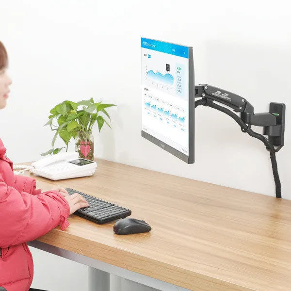 Black wall-mounted aluminium alloy computer monitor stand with telescopic rotating arm for VESA mounting.