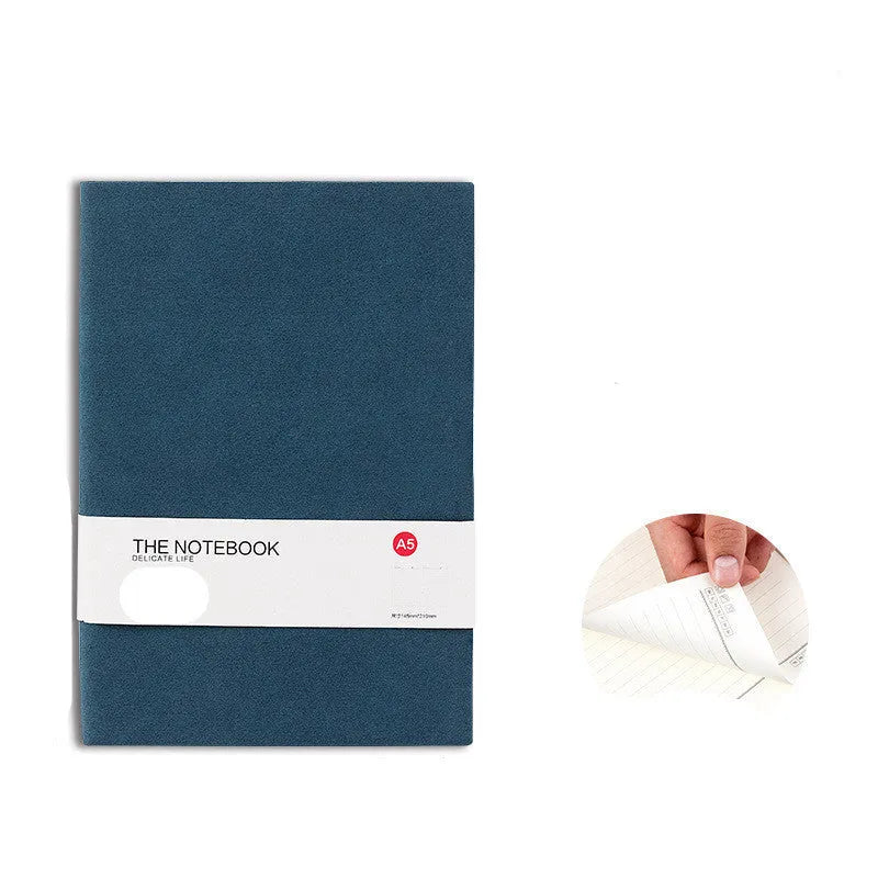 Solid colour thickened A5 and A6 notebooks in green, dark blue, and orange red.