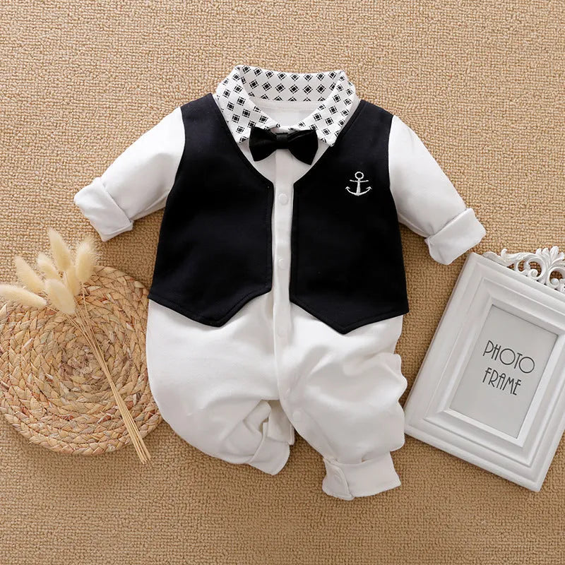 Baby jumpsuit in cotton fabric, long sleeves, shown in navy blue gentleman style.
