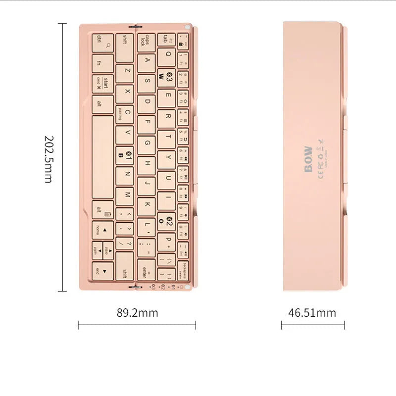 Silver aluminium folding Bluetooth keyboard with stand holding smartphone