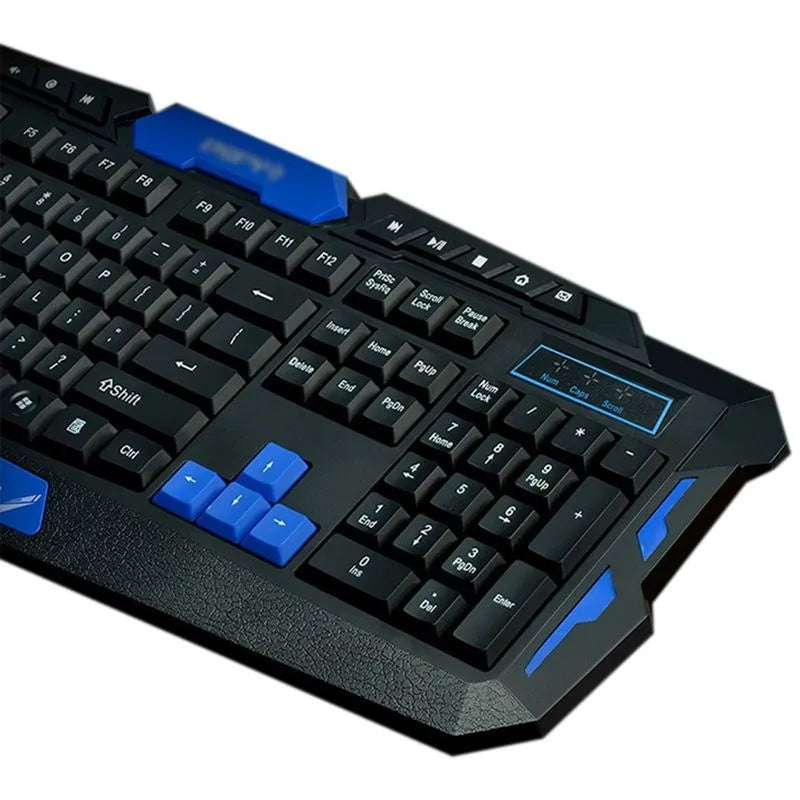 Blue and black wireless keyboard and mouse set on a desk with USB receiver.