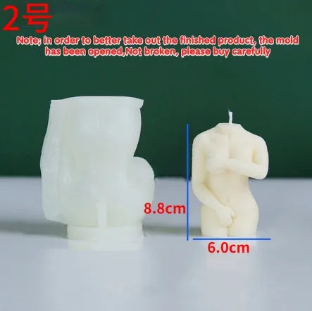 Silicone mould for making detailed shy female body shaped candles in three different poses.