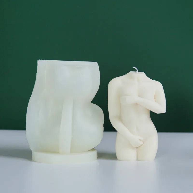 Silicone mould for making detailed shy female body shaped candles in three different poses.