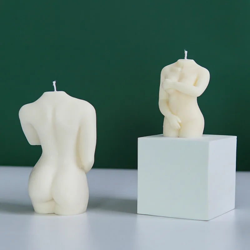 Silicone mould for making detailed shy female body shaped candles in three different poses.
