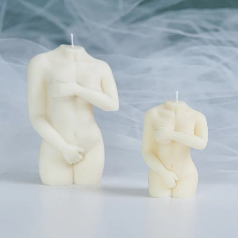 Silicone mould for making detailed shy female body shaped candles in three different poses.