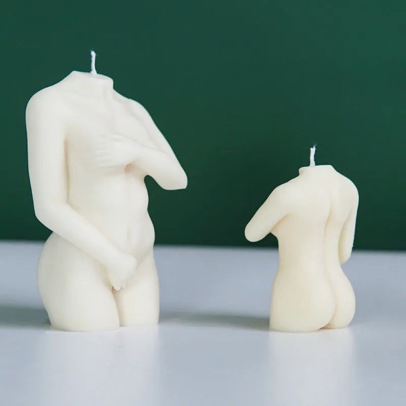 Silicone mould for making detailed shy female body shaped candles in three different poses.