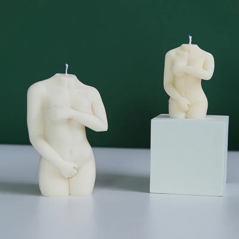 Silicone mould for making detailed shy female body shaped candles in three different poses.