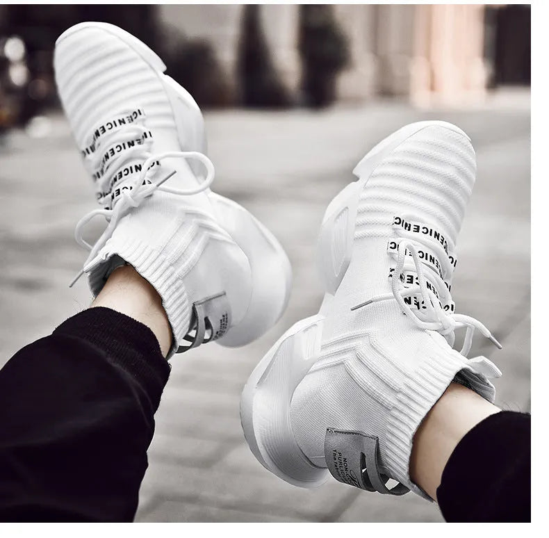 Men's black and white casual sports shoes with mesh lining, shown in large sizes
